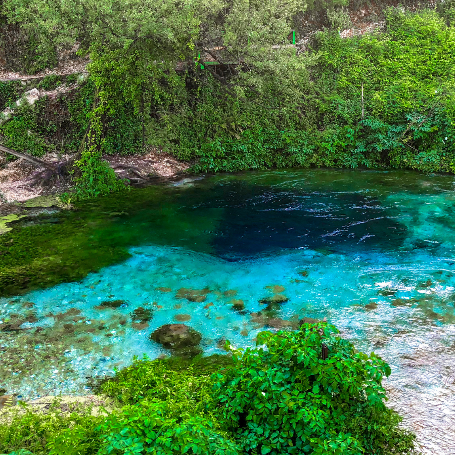 The Blue Eye natural spring near Sarandë, Albania — vivid turquoise water bubbling up from an underground source
